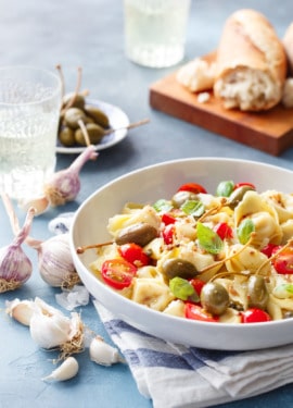 Looking for a quick & easy weeknight dinner recipe? Try this tortelloni with anchovies, capers, and cherry tomatoes!