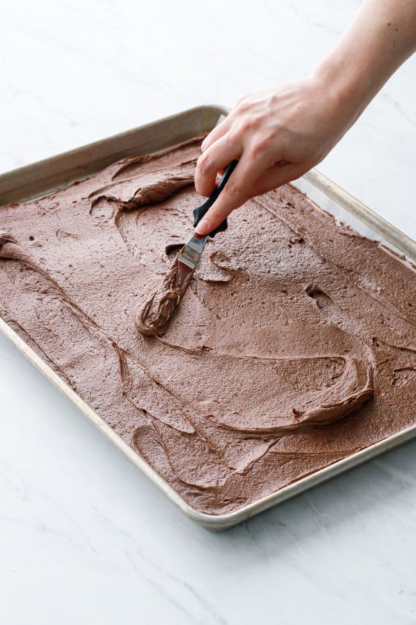 How to make brownie ice cream sandwiches: spread batter into a thin even layer in pan.