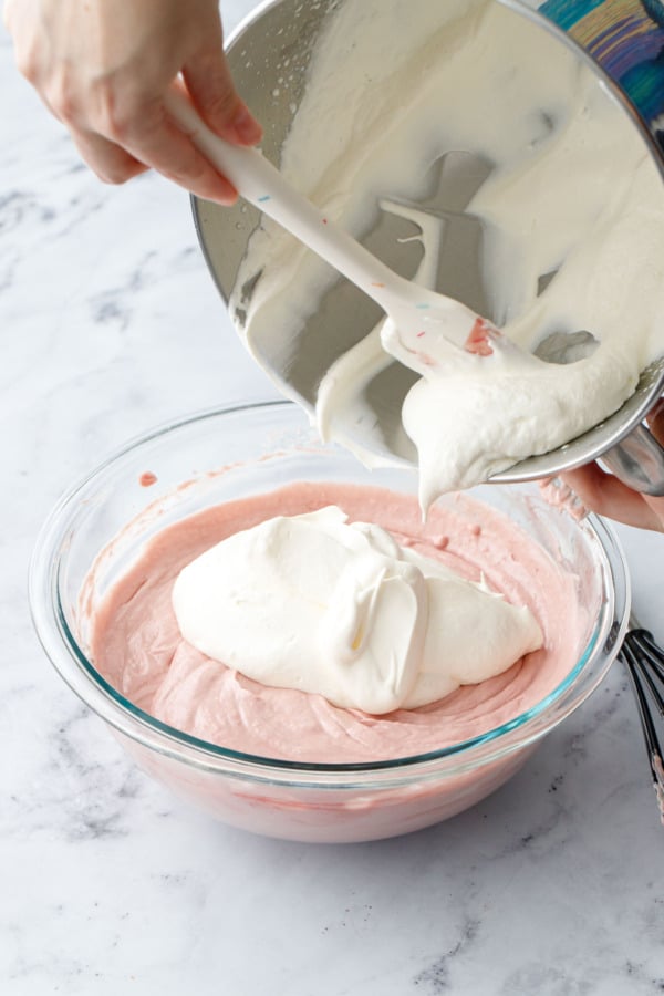 Add remaining whipped cream to bowl with lightened mousse mixture.