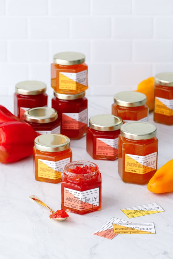 Jars of red and orange pepper jelly with printable labels