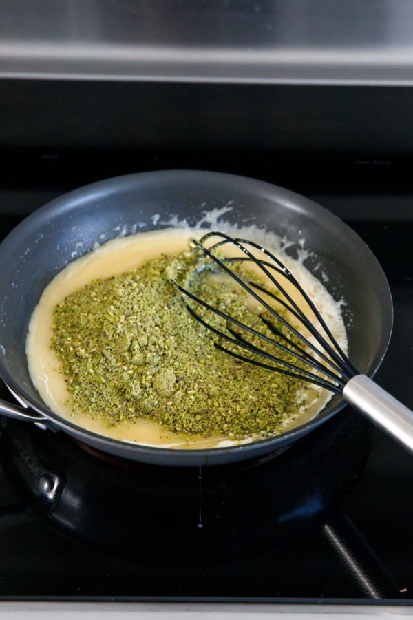 Add pistachio flour or ground pistachios and whisk to combine.